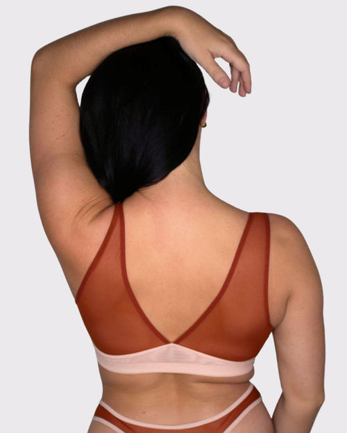 Terracotta / Implants & pocketed mesh plunge neckline bralette on implants model, pocketed for breast forms is desired or needed full body view