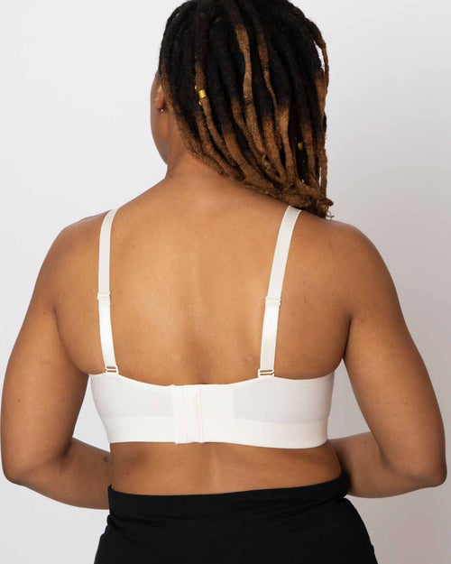 Ivory / Implants & molded cup bra contour chest with adjustable straps on implant reconstruction model back view