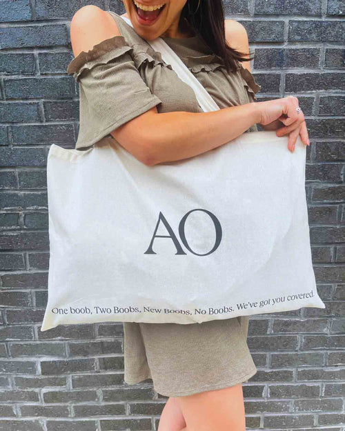 Champagne & anaono exclusive tote bag with new logo and new boob graphics available for limited time only with AO LOGO