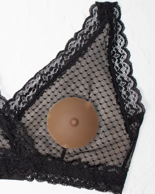 Almond & Flat lay image of the almond perkie nipples set with the matching nipple case