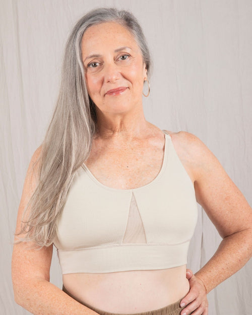 Oat / Flat & pocketed leisure bra with mesh panel sides and underwire free design front view