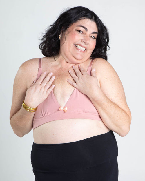 Blush / Flap Reconstruction & pocketed plunge t-shirt bra with soft wire free cups, back hook closure and adjustable straps on model.