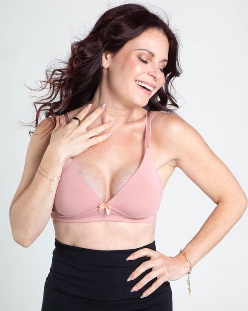 Blush / Flap Reconstruction & pocketed plunge t-shirt bra with soft wire free cups, back hook closure and adjustable straps on model.
