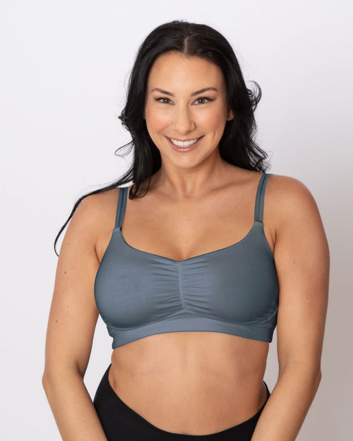 Slate / Flap Reconstruction & pocketed full coverage t-shirt bra with soft wire free cups, back hook closure and adjustable straps on model.