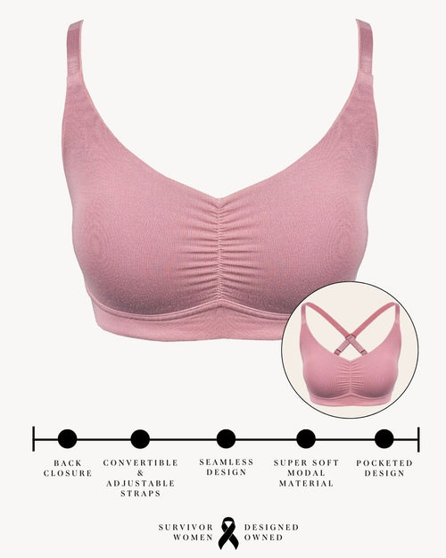 Blush / Mastectomy & pocketed full coverage t-shirt bra with soft wire free cups, back hook closure and adjustable straps on model.