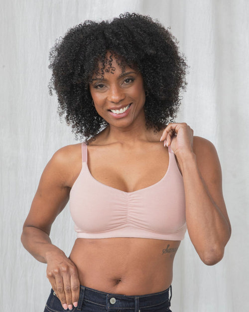 Sand / Implants & pocketed full coverage t-shirt bra with soft wire free cups, back hook closure and adjustable straps on implant model.