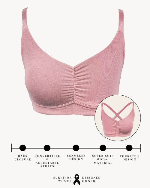 Blush / Mastectomy & pocketed full coverage t-shirt bra with soft wire free cups, back hook closure and adjustable straps on model.