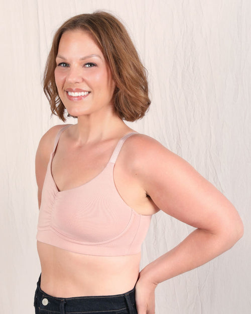 Sand / Implants & pocketed full coverage t-shirt bra with soft wire free cups, back hook closure and adjustable straps on implant model.