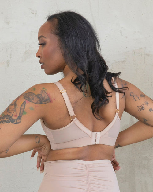Latte / Implants & Front view of the Brenda Pocketed Mesh Bra in latte, featuring a sheer V-neckline and a smooth, sheer wire-free plunge bra silhouette.