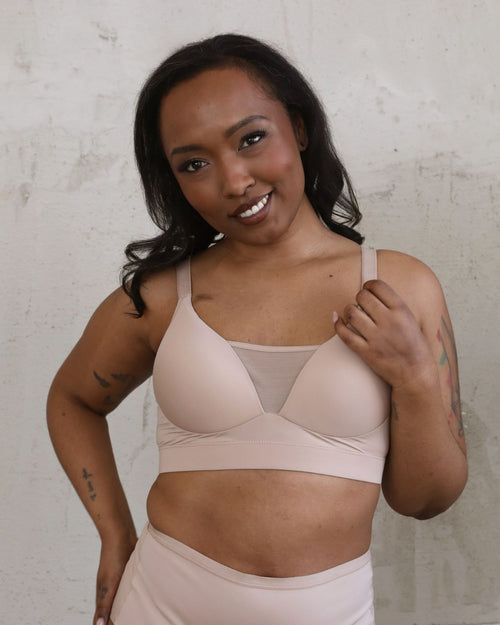 Latte / Implants & Front view of the Brenda Pocketed Mesh Bra in latte, featuring a sheer V-neckline and a smooth, sheer wire-free plunge bra silhouette.