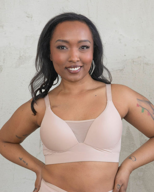 Latte / Implants & Front view of the Brenda Pocketed Mesh Bra in latte, featuring a sheer V-neckline and a smooth, sheer wire-free plunge bra silhouette.
