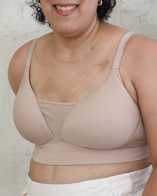 Latte / Implants & Front view of the Brenda Pocketed Mesh Bra in latte, featuring a sheer V-neckline and a smooth, sheer wire-free plunge bra silhouette.