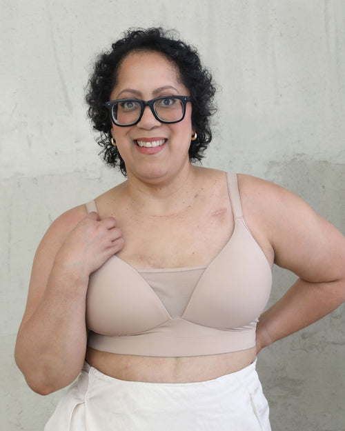 Latte / Implants & Front view of the Brenda Pocketed Mesh Bra in latte, featuring a sheer V-neckline and a smooth, sheer wire-free plunge bra silhouette.