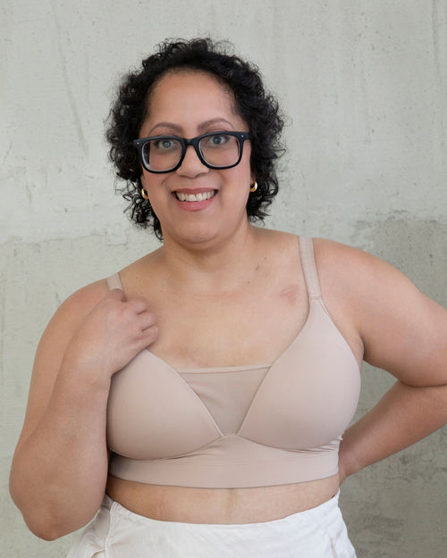 Latte / Implants & Front view of the Brenda Pocketed Mesh Bra in latte, featuring a sheer V-neckline and a smooth, sheer wire-free plunge bra silhouette.