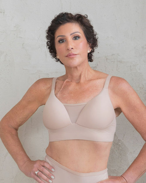 Latte / Implants & Front view of the Brenda Pocketed Mesh Bra in latte, featuring a sheer V-neckline and a smooth, sheer wire-free plunge bra silhouette.