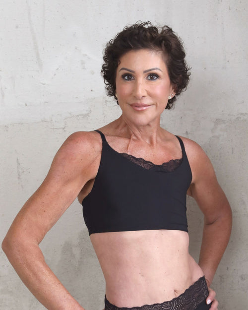 Black / Flat & Front view of the Tammi full coverage lace bralette in black, showing the feminine lace trim neckline and smooth, wire-free fit.
