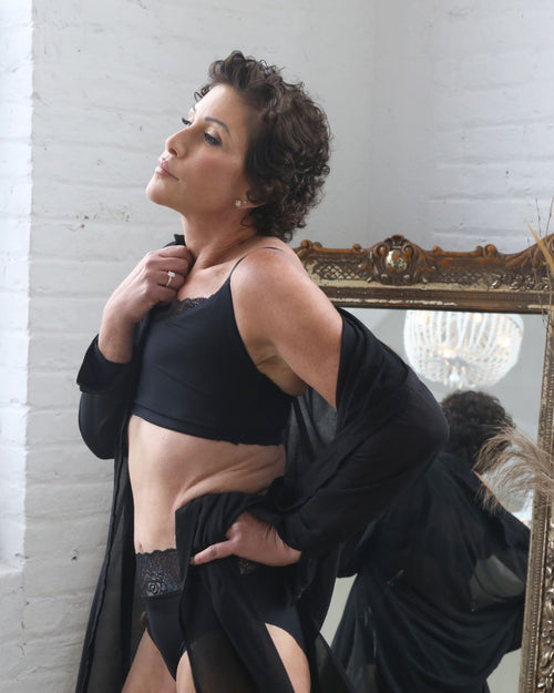 Black / Flat & Front view of the Tammi full coverage lace bralette in black, showing the feminine lace trim neckline and smooth, wire-free fit.