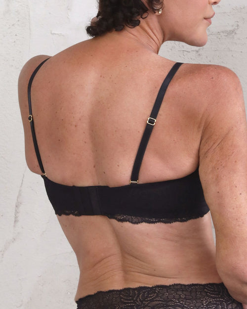 Black / Flat & Front view of the Tammi full coverage lace bralette in black, showing the feminine lace trim neckline and smooth, wire-free fit.