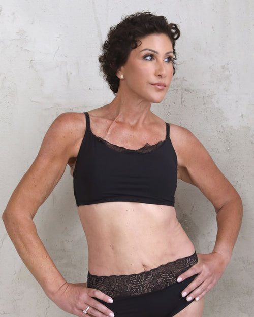 Black / Flat & Front view of the Tammi full coverage lace bralette in black, showing the feminine lace trim neckline and smooth, wire-free fit.
