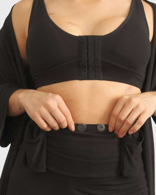 Black & elastic drain belt with two pockets.