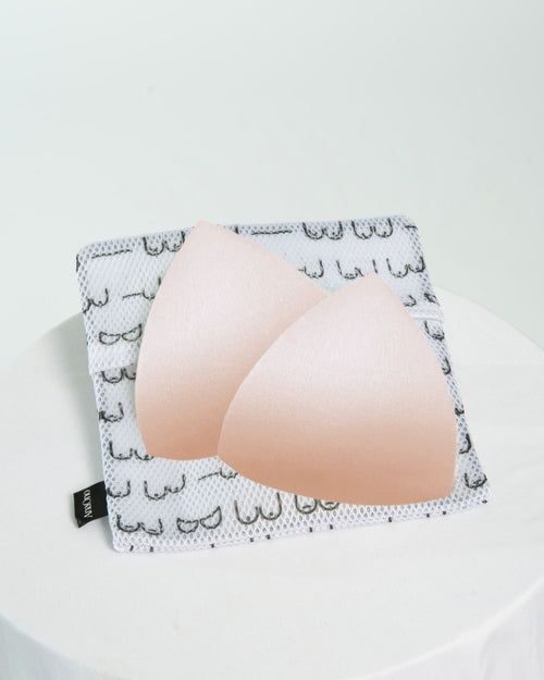 Champagne & modesty pad set from anaono with matching modesty pad pouch with boob graphics
