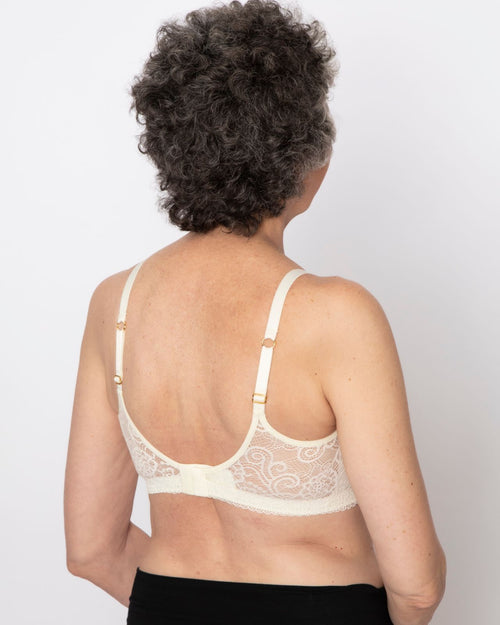 Ivory / Au Natural & pocketed lace soft cup bralette with adjustable straps on au natural model back view