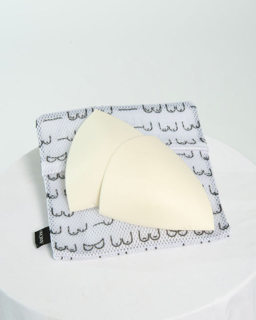 Ivory & bra inserts for anaono bras that fit into the pockets of the bras with matching bag